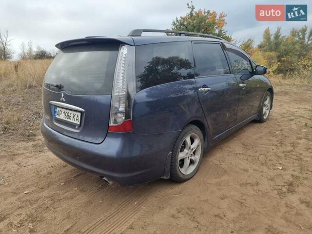 Синий Мицубиси Грандис, объемом двигателя 2.38 л и пробегом 220 тыс. км за 6500 $, фото 2 на Automoto.ua