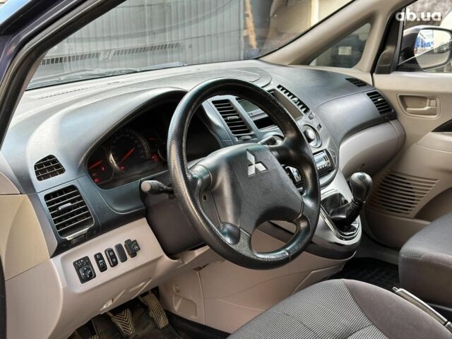 Синий Мицубиси Грандис, объемом двигателя 2.4 л и пробегом 250 тыс. км за 6490 $, фото 6 на Automoto.ua