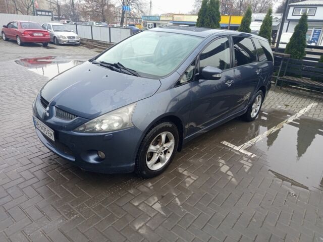 Синий Мицубиси Грандис, объемом двигателя 2 л и пробегом 320 тыс. км за 6550 $, фото 1 на Automoto.ua