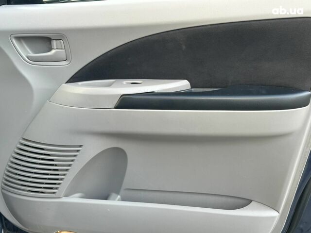 Синий Мицубиси Грандис, объемом двигателя 2.4 л и пробегом 250 тыс. км за 6490 $, фото 20 на Automoto.ua