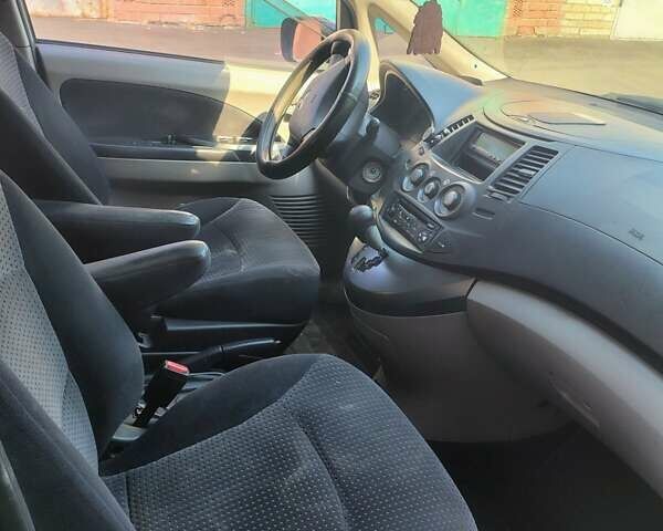 Синий Мицубиси Грандис, объемом двигателя 2.4 л и пробегом 380 тыс. км за 5700 $, фото 11 на Automoto.ua