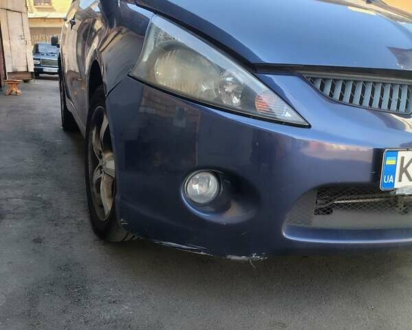 Синий Мицубиси Грандис, объемом двигателя 2.4 л и пробегом 380 тыс. км за 5700 $, фото 9 на Automoto.ua