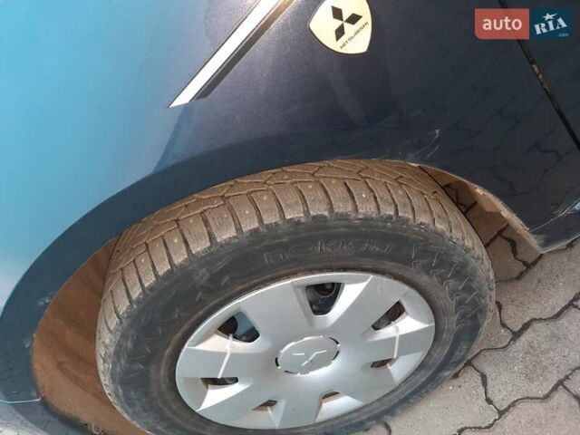 Синий Мицубиси Грандис, объемом двигателя 2.38 л и пробегом 221 тыс. км за 6700 $, фото 5 на Automoto.ua