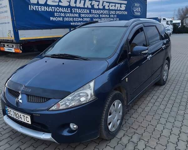 Синий Мицубиси Грандис, объемом двигателя 2.38 л и пробегом 221 тыс. км за 6700 $, фото 1 на Automoto.ua