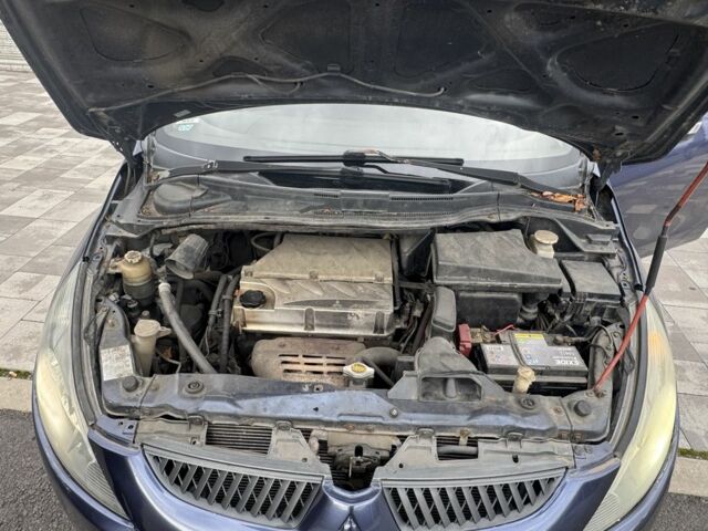 Мицубиси Грандис 2004 в Белой Церкве на Automoto.ua Синий Мицубиси Грандис, объемом двигателя 2.4 л и пробегом 396 тыс. км за 3999 $, фото 22 на Automoto.ua