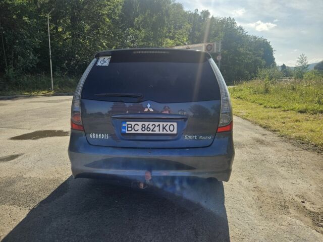 Синий Мицубиси Грандис, объемом двигателя 2.4 л и пробегом 226 тыс. км за 6100 $, фото 2 на Automoto.ua