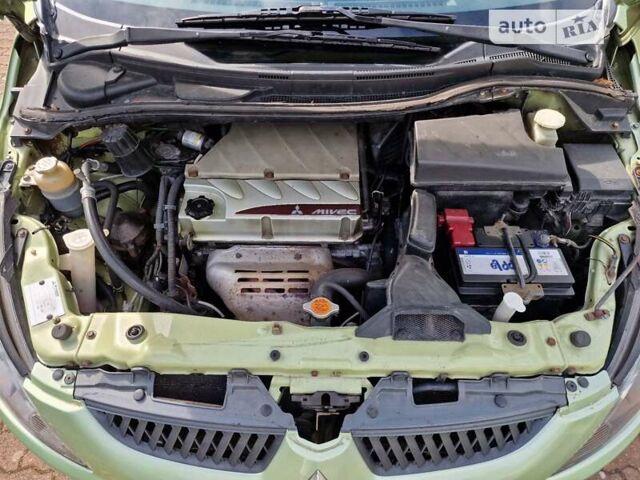Зеленый Мицубиси Грандис, объемом двигателя 2.38 л и пробегом 280 тыс. км за 5200 $, фото 9 на Automoto.ua