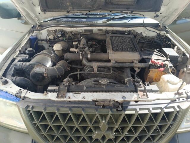 Белый Мицубиси Л 200, объемом двигателя 2.5 л и пробегом 275 тыс. км за 4700 $, фото 5 на Automoto.ua