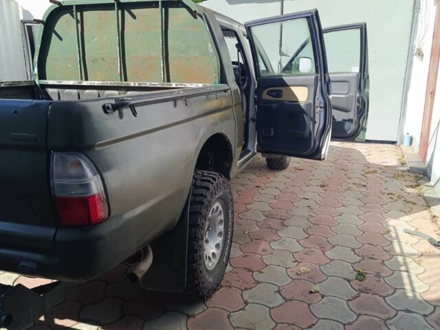 Белый Мицубиси Л 200, объемом двигателя 2.5 л и пробегом 275 тыс. км за 4700 $, фото 15 на Automoto.ua