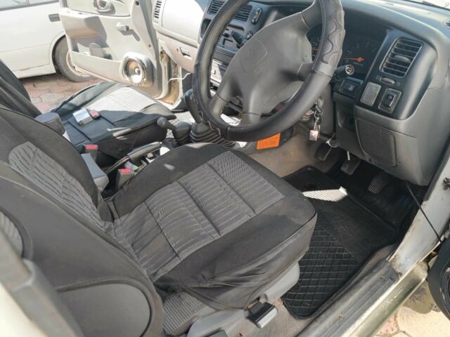 Белый Мицубиси Л 200, объемом двигателя 2.5 л и пробегом 275 тыс. км за 4700 $, фото 7 на Automoto.ua