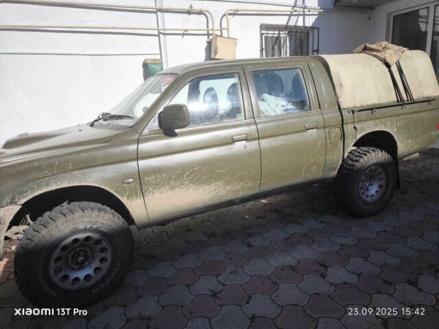 Белый Мицубиси Л 200, объемом двигателя 2.5 л и пробегом 275 тыс. км за 4700 $, фото 19 на Automoto.ua