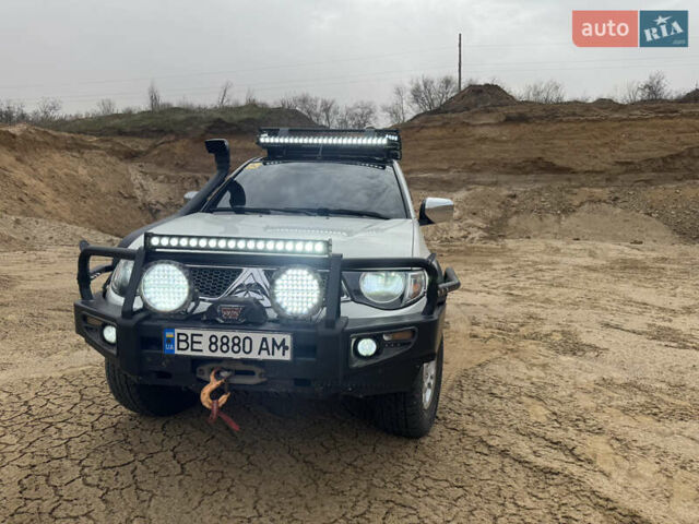 Белый Мицубиси Л 200, объемом двигателя 2.48 л и пробегом 169 тыс. км за 17200 $, фото 14 на Automoto.ua