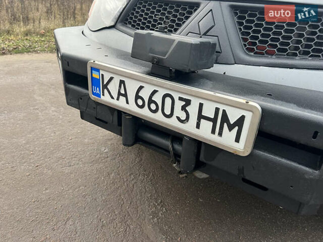 Білий Міцубісі Л 200, об'ємом двигуна 2.48 л та пробігом 324 тис. км за 13000 $, фото 8 на Automoto.ua