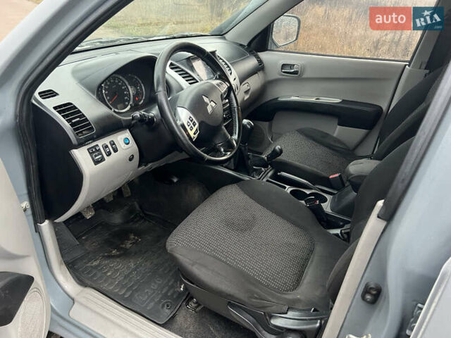 Білий Міцубісі Л 200, об'ємом двигуна 2.48 л та пробігом 324 тис. км за 13000 $, фото 13 на Automoto.ua