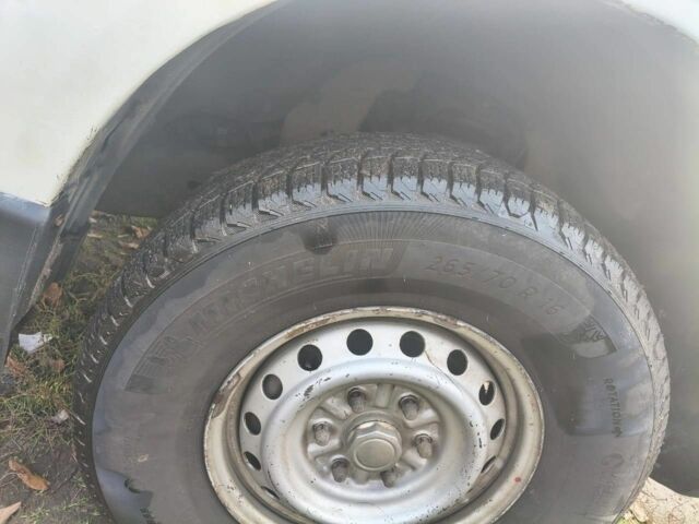 Белый Мицубиси Л 200, объемом двигателя 2.5 л и пробегом 134 тыс. км за 7200 $, фото 7 на Automoto.ua