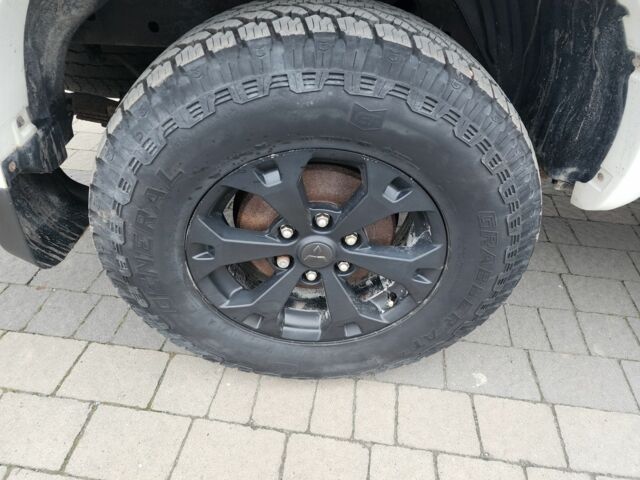 Белый Мицубиси Л 200, объемом двигателя 2.5 л и пробегом 114 тыс. км за 8510 $, фото 23 на Automoto.ua