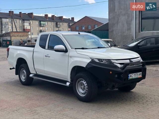 Білий Міцубісі Л 200, об'ємом двигуна 2.3 л та пробігом 152 тис. км за 22000 $, фото 4 на Automoto.ua