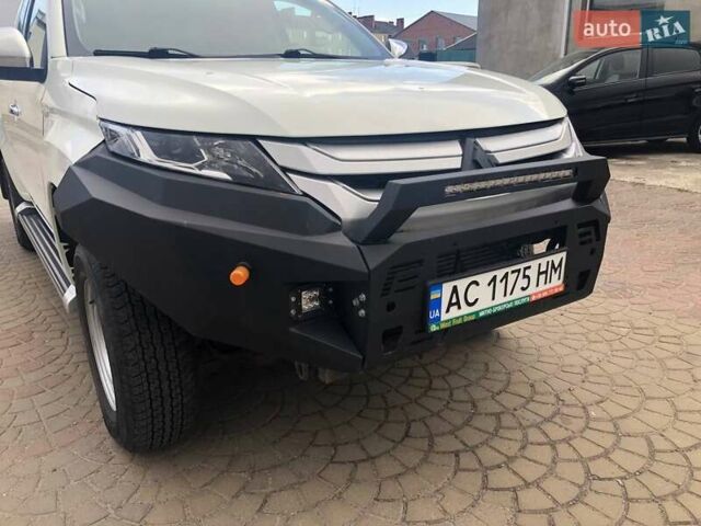 Білий Міцубісі Л 200, об'ємом двигуна 2.3 л та пробігом 152 тис. км за 22000 $, фото 38 на Automoto.ua