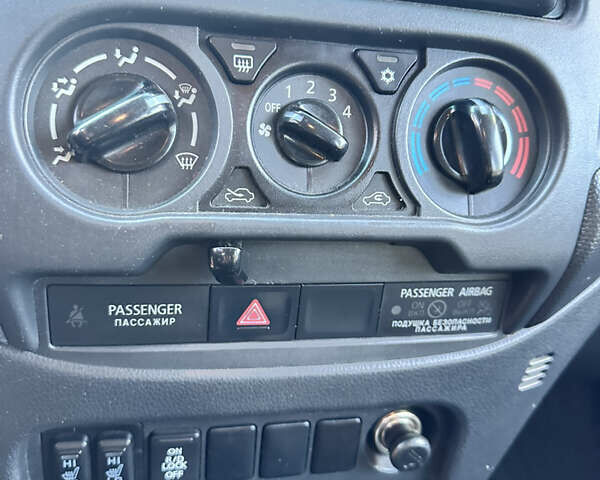 Белый Мицубиси Л 200, объемом двигателя 2.44 л и пробегом 312 тыс. км за 25000 $, фото 12 на Automoto.ua