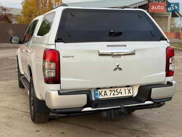 Белый Мицубиси Л 200, объемом двигателя 2.44 л и пробегом 60 тыс. км за 28500 $, фото 8 на Automoto.ua