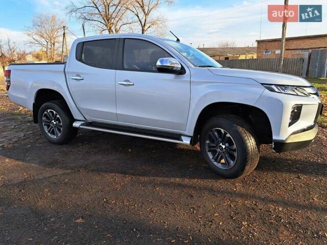 Білий Міцубісі Л 200, об'ємом двигуна 2.44 л та пробігом 56 тис. км за 28800 $, фото 11 на Automoto.ua