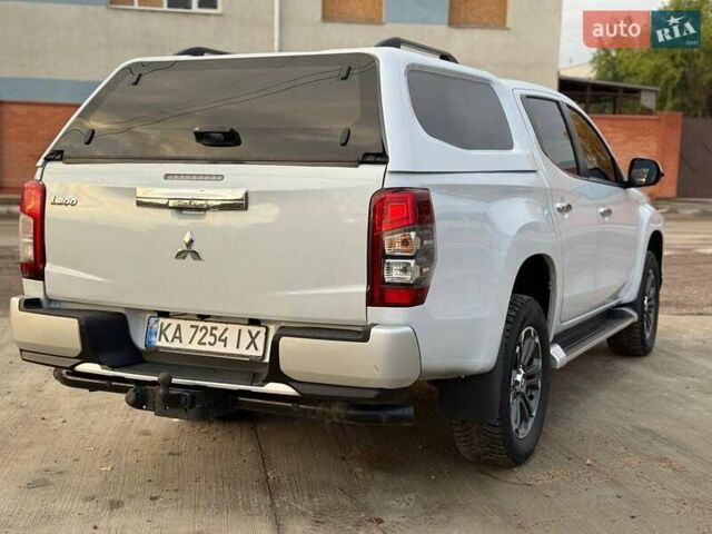Белый Мицубиси Л 200, объемом двигателя 2.44 л и пробегом 60 тыс. км за 28500 $, фото 12 на Automoto.ua