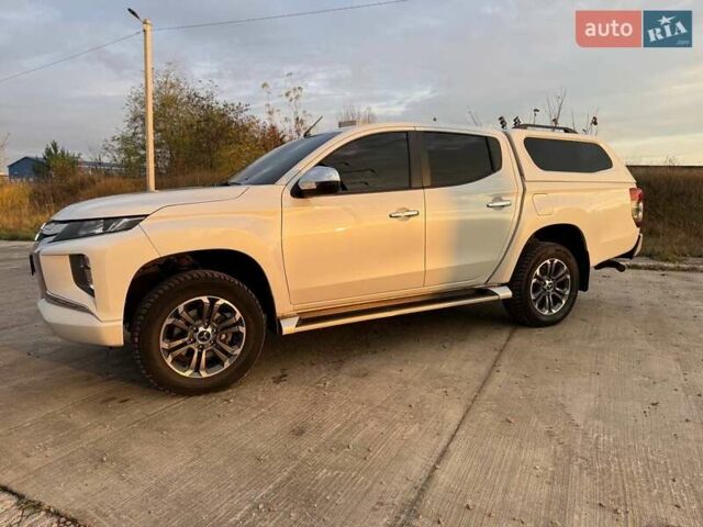 Белый Мицубиси Л 200, объемом двигателя 2.44 л и пробегом 60 тыс. км за 28500 $, фото 11 на Automoto.ua