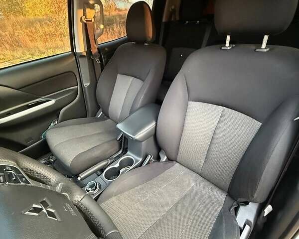 Белый Мицубиси Л 200, объемом двигателя 2.44 л и пробегом 60 тыс. км за 28500 $, фото 26 на Automoto.ua