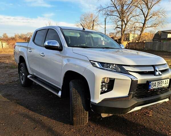 Білий Міцубісі Л 200, об'ємом двигуна 2.44 л та пробігом 56 тис. км за 28800 $, фото 1 на Automoto.ua
