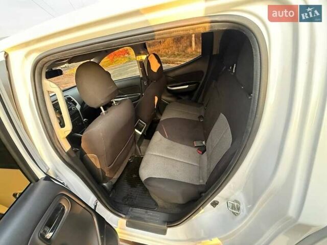 Белый Мицубиси Л 200, объемом двигателя 2.44 л и пробегом 60 тыс. км за 28500 $, фото 22 на Automoto.ua