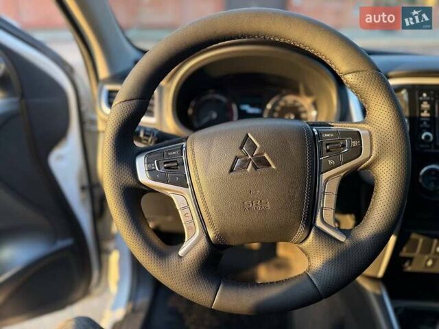 Белый Мицубиси Л 200, объемом двигателя 2.44 л и пробегом 60 тыс. км за 28500 $, фото 30 на Automoto.ua
