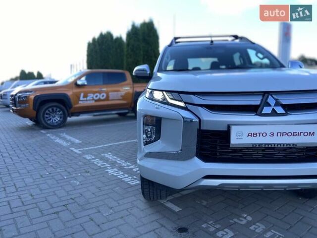 Белый Мицубиси Л 200, объемом двигателя 2.44 л и пробегом 58 тыс. км за 34999 $, фото 5 на Automoto.ua