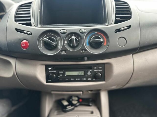 Білий Міцубісі Л 200, об'ємом двигуна 2.5 л та пробігом 234 тис. км за 4300 $, фото 7 на Automoto.ua