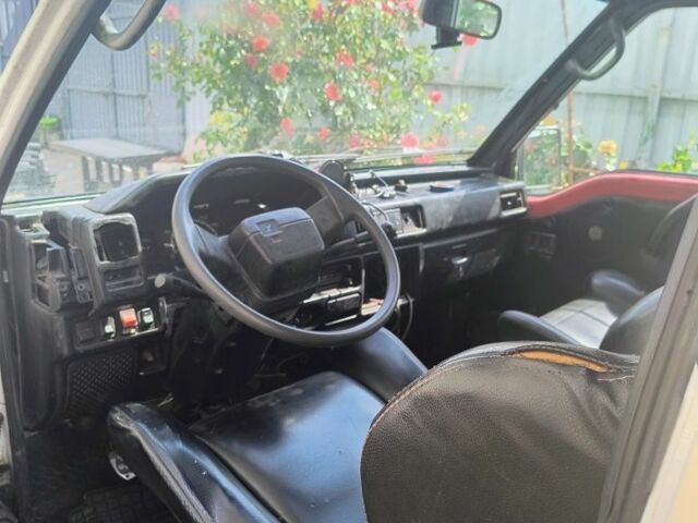 Білий Міцубісі Л 200, об'ємом двигуна 2 л та пробігом 500 тис. км за 1205 $, фото 2 на Automoto.ua