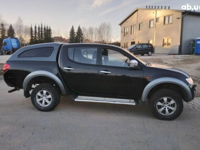 Чорний Міцубісі Л 200, об'ємом двигуна 2.5 л та пробігом 220 тис. км за 129000 $, фото 2 на Automoto.ua