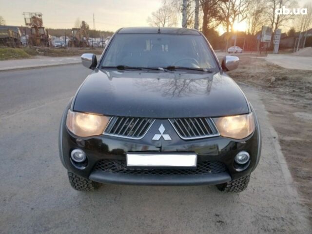 Чорний Міцубісі Л 200, об'ємом двигуна 2.5 л та пробігом 220 тис. км за 129000 $, фото 6 на Automoto.ua
