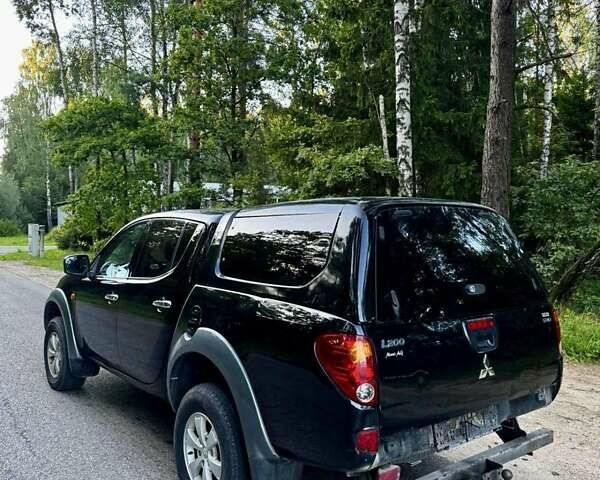 Чорний Міцубісі Л 200, об'ємом двигуна 2.5 л та пробігом 280 тис. км за 3200 $, фото 7 на Automoto.ua