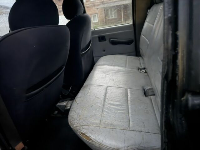 Черный Мицубиси Л 200, объемом двигателя 2.5 л и пробегом 310 тыс. км за 2700 $, фото 8 на Automoto.ua