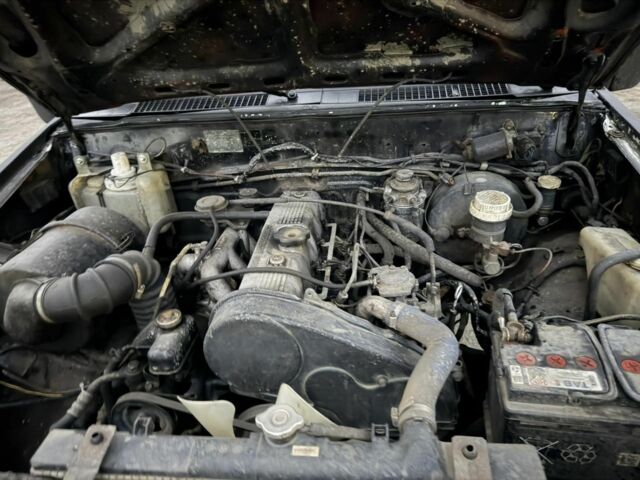 Черный Мицубиси Л 200, объемом двигателя 2.5 л и пробегом 310 тыс. км за 2700 $, фото 9 на Automoto.ua