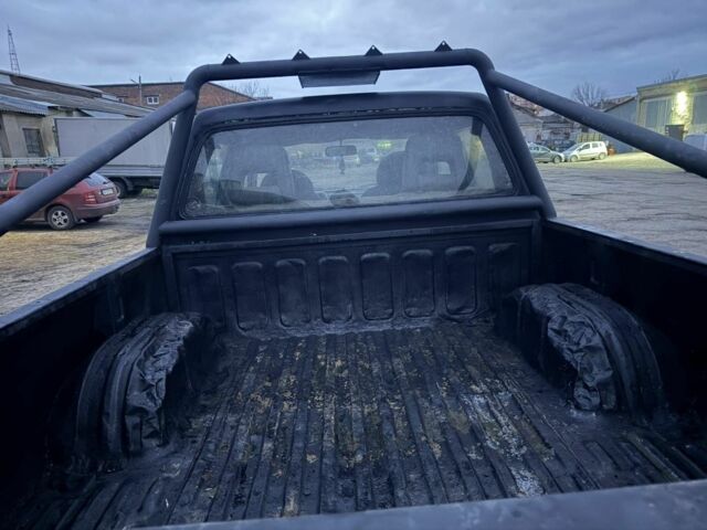 Черный Мицубиси Л 200, объемом двигателя 2.5 л и пробегом 310 тыс. км за 2700 $, фото 6 на Automoto.ua