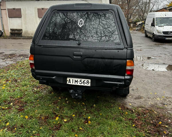 Мицубиси Л 200 1997 в Полтаве на Automoto.ua Черный Мицубиси Л 200, объемом двигателя 2.5 л и пробегом 600 тыс. км за 6500 $, фото 2 на Automoto.ua