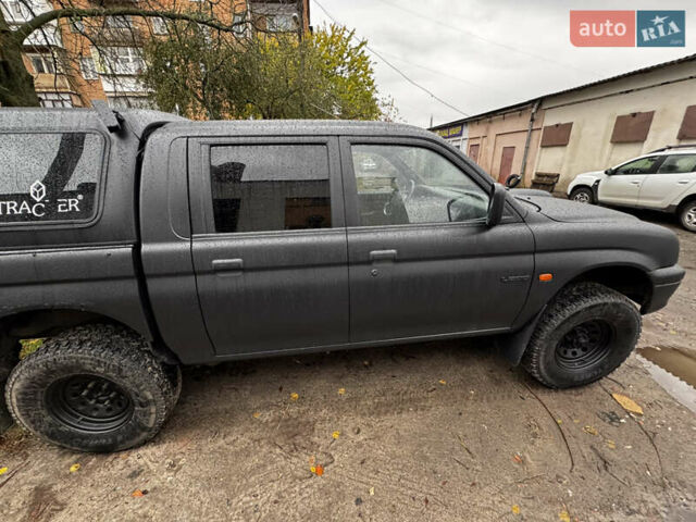 Мицубиси Л 200 1997 в Полтаве на Automoto.ua Черный Мицубиси Л 200, объемом двигателя 2.5 л и пробегом 600 тыс. км за 6500 $, фото 1 на Automoto.ua