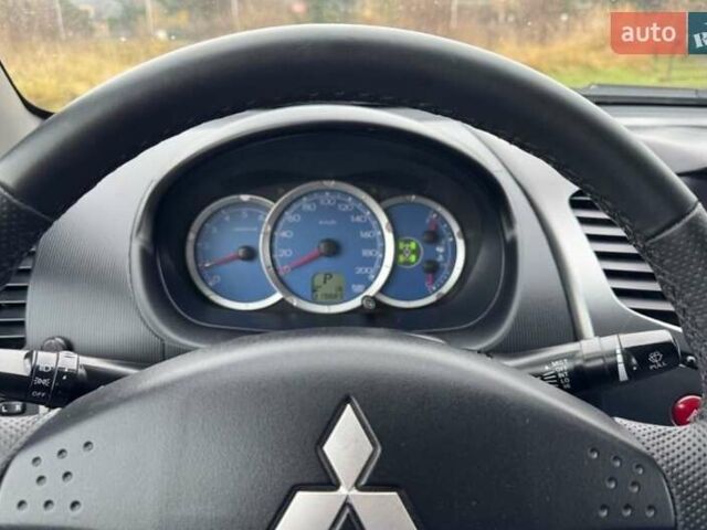 Черный Мицубиси Л 200, объемом двигателя 2.5 л и пробегом 236 тыс. км за 3700 $, фото 7 на Automoto.ua