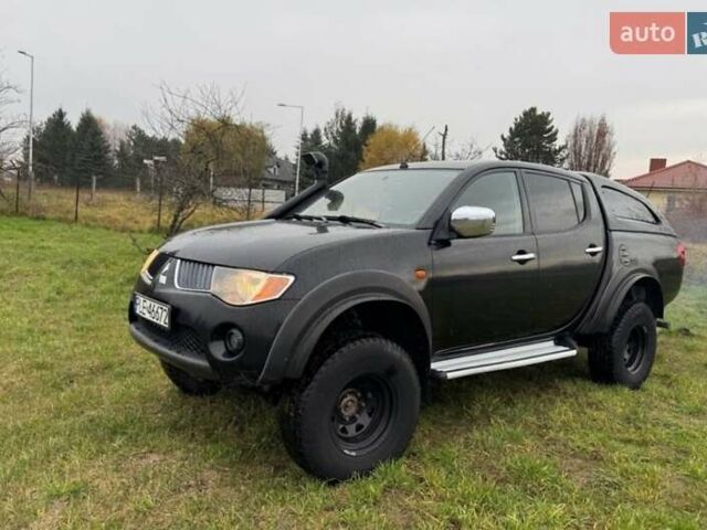 Черный Мицубиси Л 200, объемом двигателя 2.5 л и пробегом 236 тыс. км за 3700 $, фото 1 на Automoto.ua