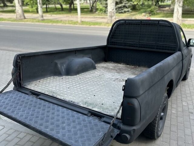 Чорний Міцубісі Л 200, об'ємом двигуна 2 л та пробігом 250 тис. км за 2300 $, фото 6 на Automoto.ua