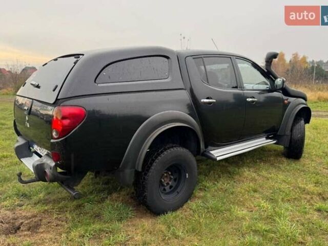 Черный Мицубиси Л 200, объемом двигателя 2.5 л и пробегом 236 тыс. км за 3700 $, фото 6 на Automoto.ua