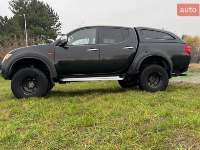 Черный Мицубиси Л 200, объемом двигателя 2.5 л и пробегом 236 тыс. км за 3700 $, фото 3 на Automoto.ua