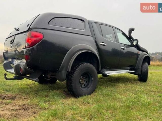 Черный Мицубиси Л 200, объемом двигателя 2.5 л и пробегом 236 тыс. км за 3700 $, фото 12 на Automoto.ua