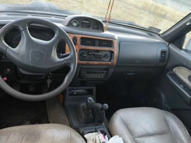 Чорний Міцубісі Л 200, об'ємом двигуна 0 л та пробігом 310 тис. км за 1802 $, фото 3 на Automoto.ua