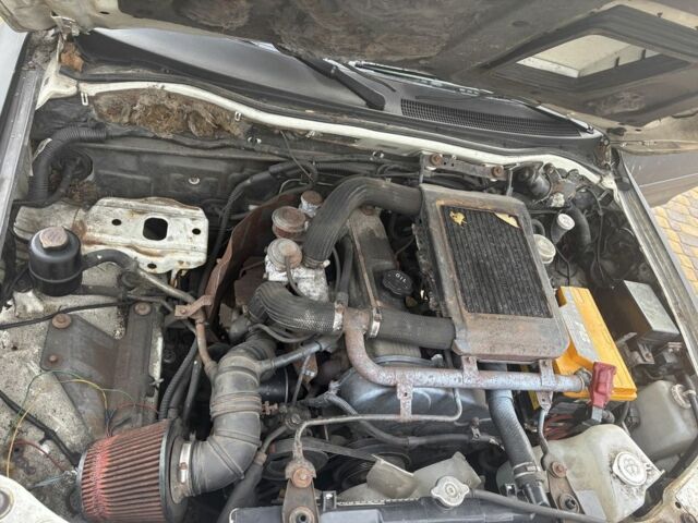 Чорний Міцубісі Л 200, об'ємом двигуна 2.5 л та пробігом 220 тис. км за 5600 $, фото 6 на Automoto.ua